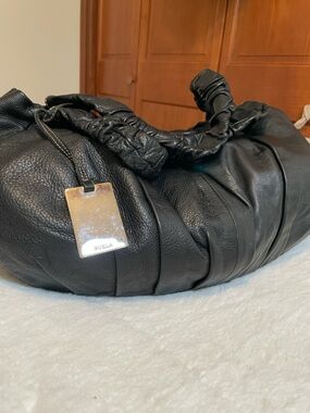 Furla Black Pebbled Leather Duffel Bag with Metal Tag